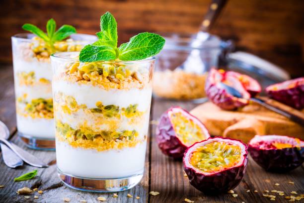 istock Yogurt parfait with granola, peach sauce and passion fruit with mint 657786686