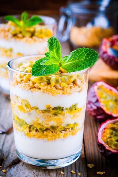 istock Yogurt parfait with granola, peach sauce and passion fruit with mint 657786782