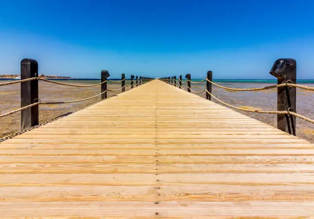 Wooden walkway in Egypt at low tide