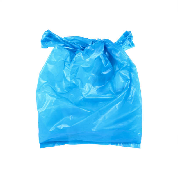 istock one tied blue plastic bag isolated on white 657790898