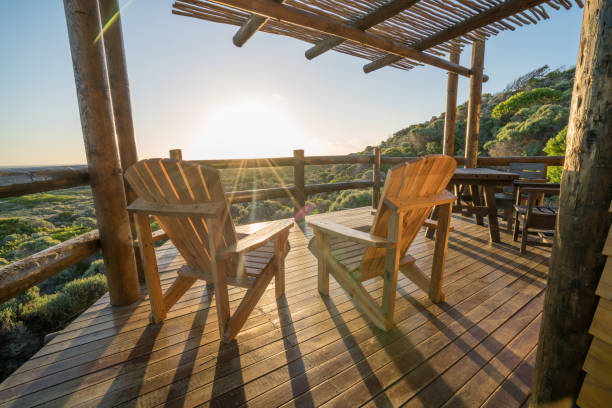 istock View of log cabin the nature at sunset 657791262