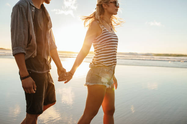 istock Couple on summer vacation at the beach 657791666