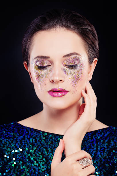istock Perfect Woman with Artistic Makeup and Glitters Eye Shadow 657795262