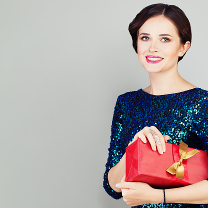 Fashion Model Woman with Gift Box