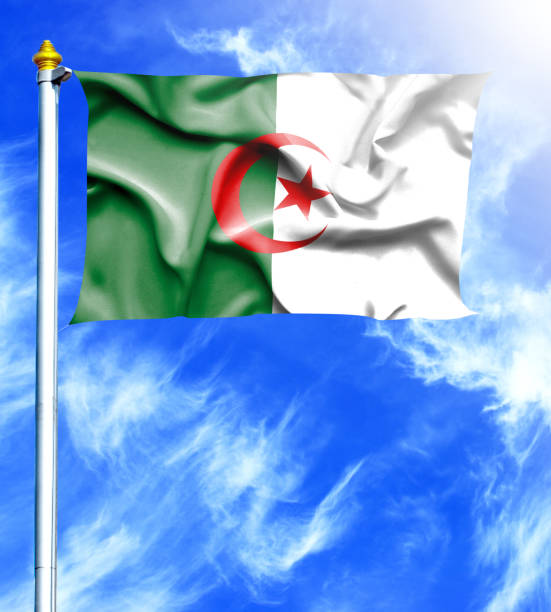Blue sky and mast with hanged waving flag of Algeria Blue sky and mast with hanged waving flag of Algeria algeria flag silhouettes stock pictures, royalty-free photos & images