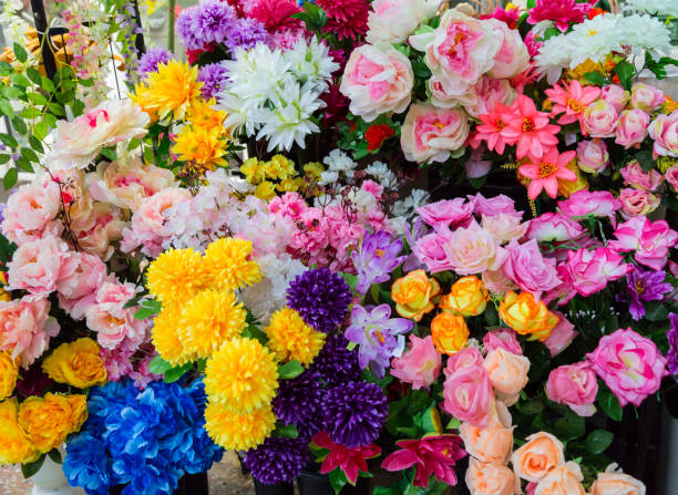 istock Artificial flowers on the market 657802556