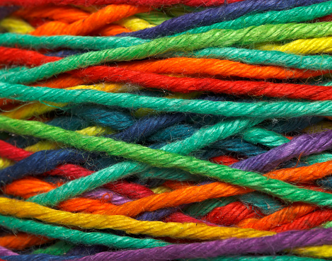 The multicolored yarn used for knitting clothes