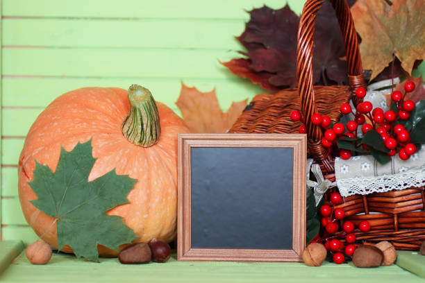 istock pumpkin wooden table autumn harvest 657815506