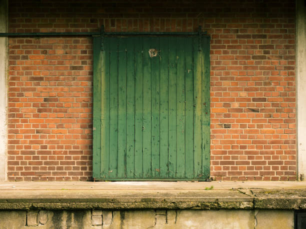 istock old green wooden sliding door 657823148