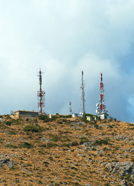 istock Telecommunication towers with antennas on the hill. 657836066