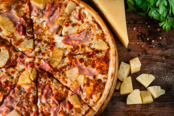 istock Italian cuisine. Fresh Hawaiian pizza close up view. 657837146