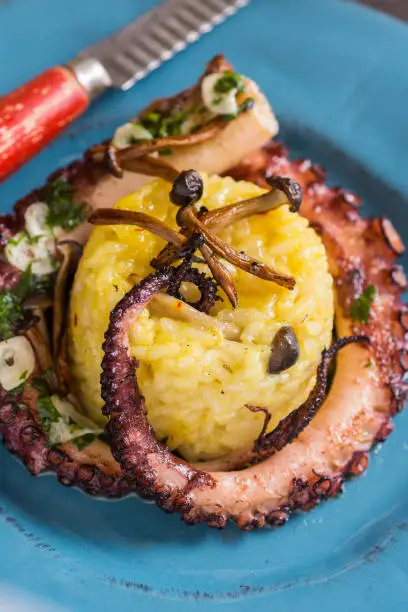 Grilled Seafood Octopus on Saffron Risotto with Brown Shimeji Mushrooms