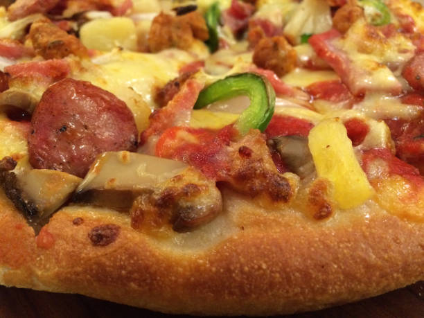 istock Delicious pizza Serve hot wooden pan 657840474