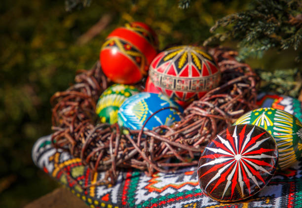 istock Easter eggs in the nest  on a embroidered towel. 657843660