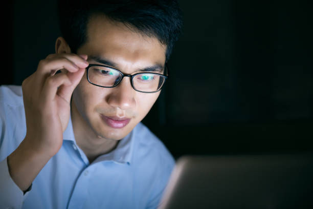 istock Young businessman working stressed at night 657843982