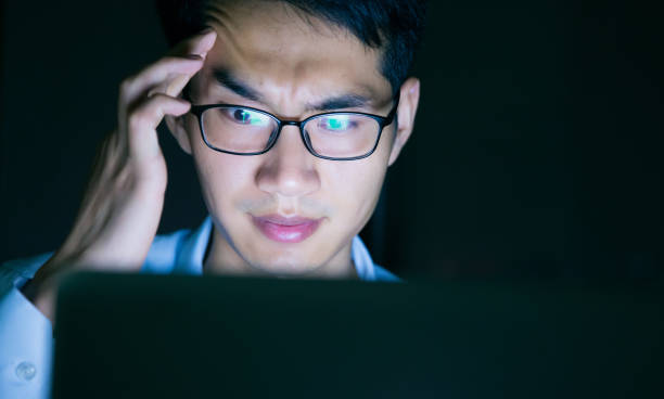 istock Young businessman working stressed at night 657844096