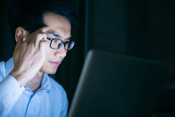 istock Young businessman working stressed at night 657844154
