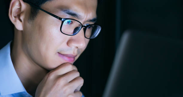istock Young businessman working stressed at night 657844180