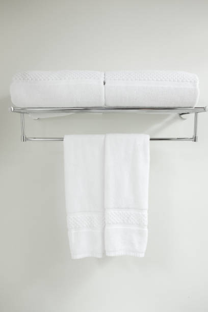 istock Towel rack closeup background of a wall 657847548