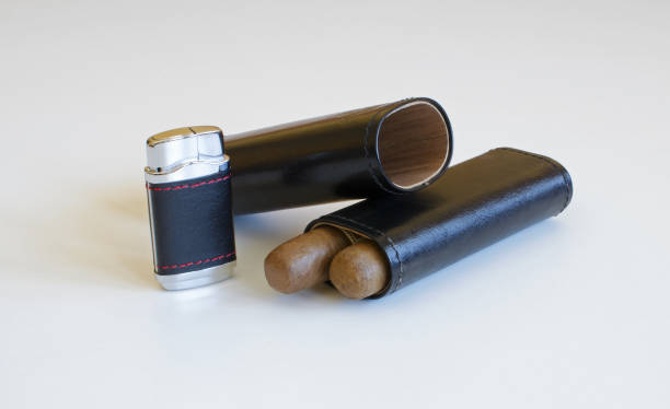 istock Still life with a cigar lighter and a leather case 657847580