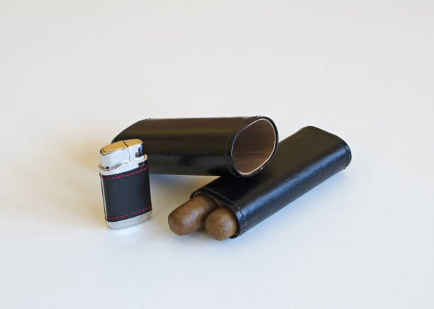 istock Still life with a cigar lighter and a leather case 657847586