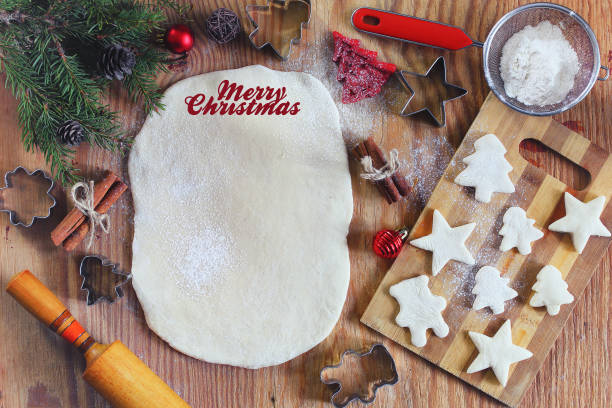istock Flour cooking ginger cookies on Christmas Eve 657857420