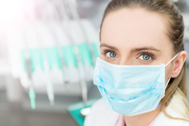 istock Female doctor with surgical mask 657865432