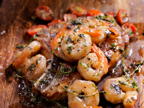 istock Grilled Pork Chop with Shrimp Scampi 657868328