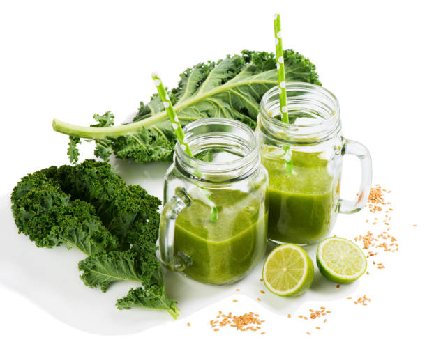 istock Jar mason mugs of kale smoothie. 657868604