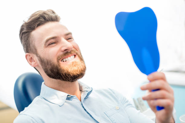 istock Man with great smile at the dental office 657869148