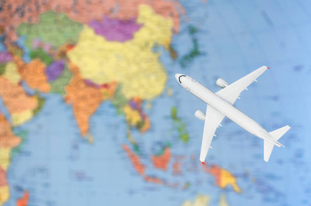 istock Flight to Asia symbolic image of travel by plane map 657871908