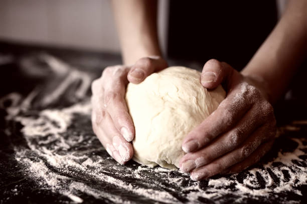 istock pizza prepare dough hand topping 657878180