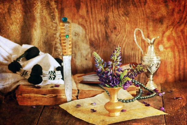 istock retro scratched effect concept arabian faith with book and flowe 657879086