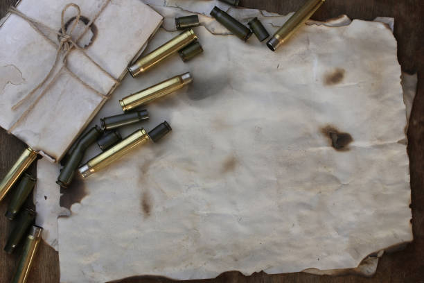 istock bullet and retro paper on the table 657884514