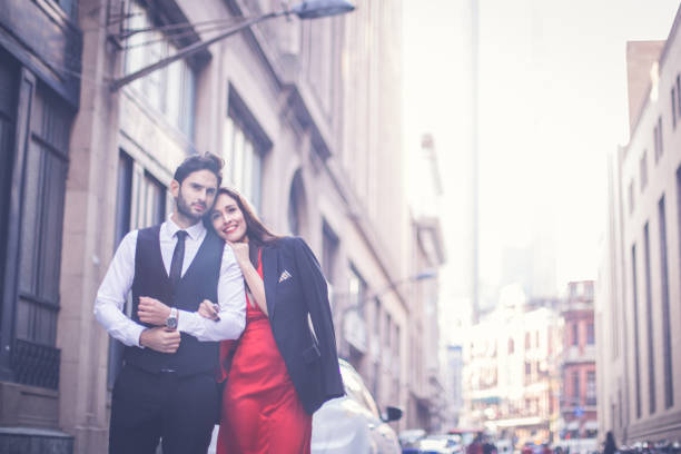 istock Beautiful elegant couple on the street 657888416