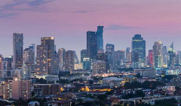 istock City office building light night view 657891592