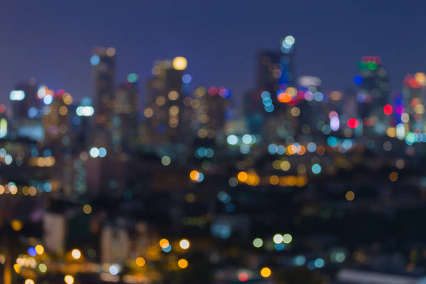 istock Night blurred bokeh city office building light 657894940