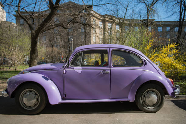 Bucharest: Colorful Wolkswagen Beetle car in Bucharest in a spring day.