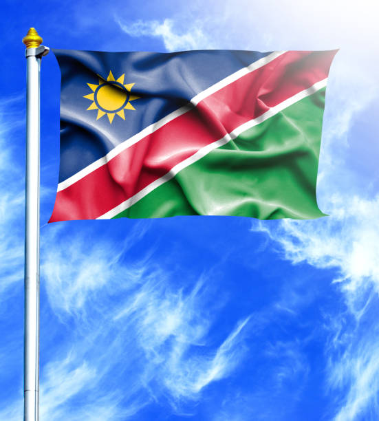 istock Blue sky and mast with hanged waving flag of Namibia 657902046