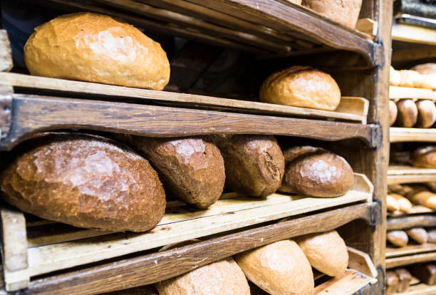istock Freshly baked bread on wooden trays 657904616
