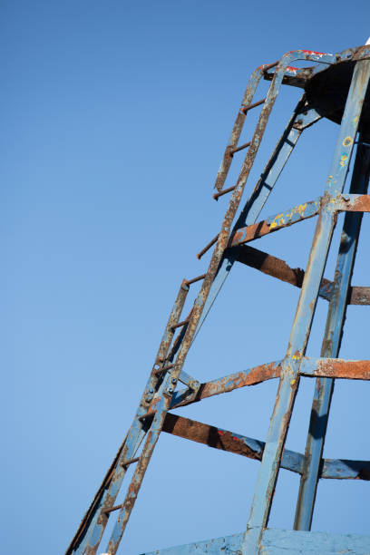 Steel rusty structure with broken ladder is this a Health Safety risk?