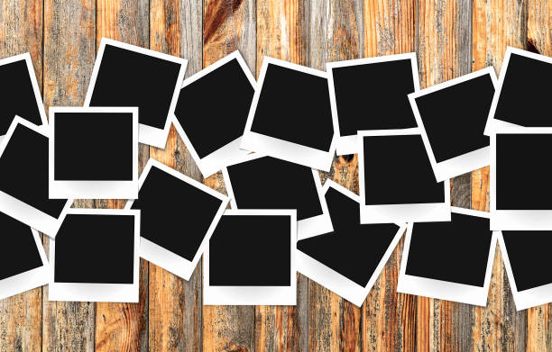 istock Photo frames pack on old painted vintage wooden background 657908328