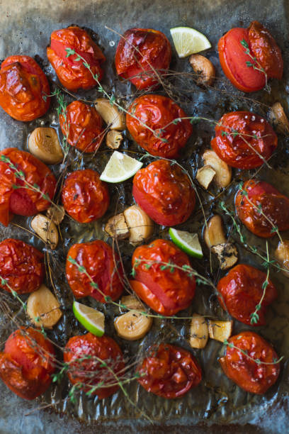 istock Baked tomatoes with thyme and garlic 657911444