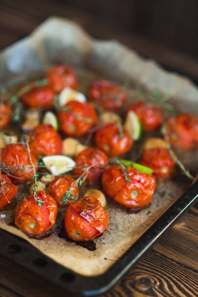 istock Baked tomatoes with thyme and garlic 657911476
