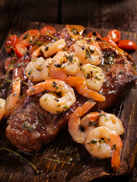istock Grilled T-Bone Steak with Shrimp Scampi 657913754