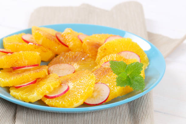 salad with avocado, orange, tangerine, grapefruit, arugula