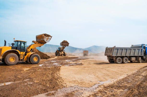 istock Tipper trucks and Loaders in operation (Earthworks ) 657914964