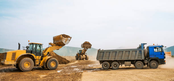 istock Tipper trucks and Loaders in operation (Earthworks ) 657914966
