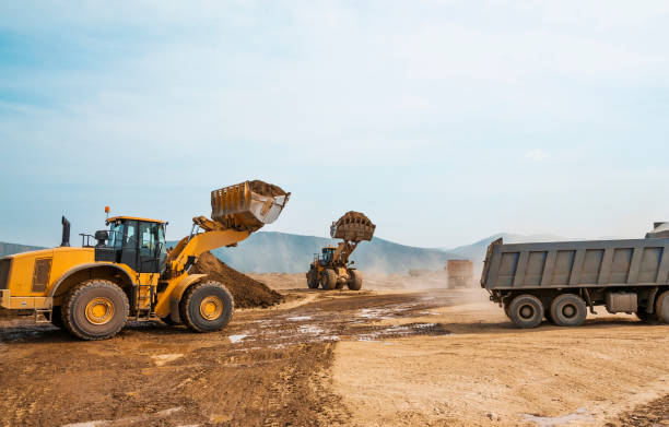 istock Tipper trucks and Loaders in operation (Earthworks ) 657914972