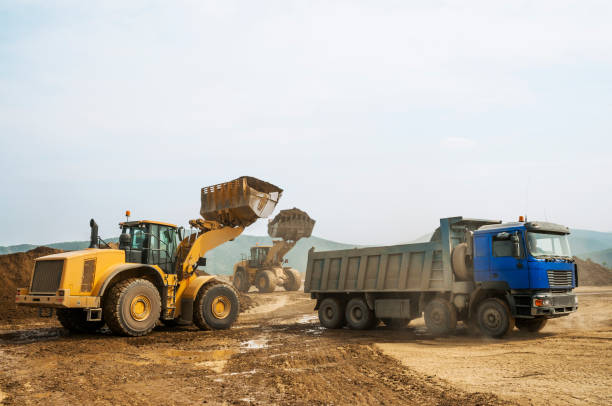 istock Tipper trucks and Loaders in operation (Earthworks ) 657914988